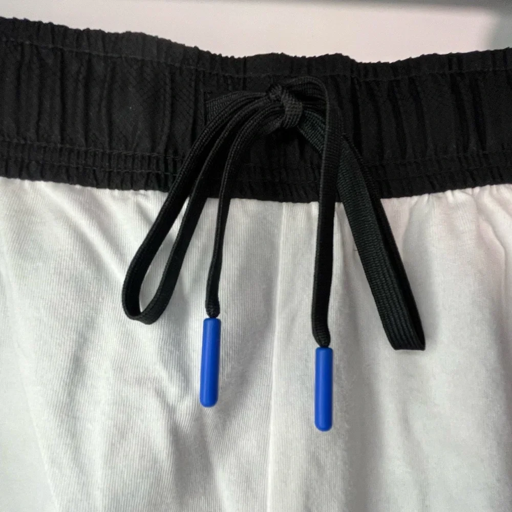 LACOSTE Athletic Pull-on Fully Lined Shorts w/side pockets & Logo Side Bands - Picture 14 of 16